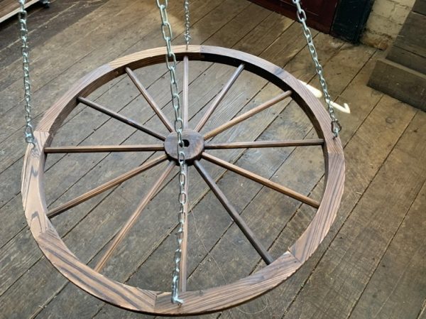 Persephone violet prop hire - large wooden wheel
